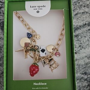 Kate Spade Gold Charm Necklace with Red and Black Accents